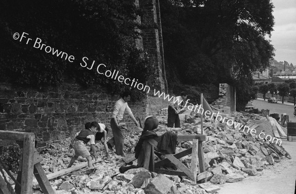 WORKERS AT MARIAN SHRINE BELOW CARRIG HOUSE